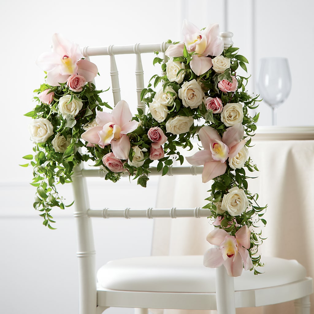 Orchid Rose Chair Décor – Loveland Colorado Flowers, Loveland CO